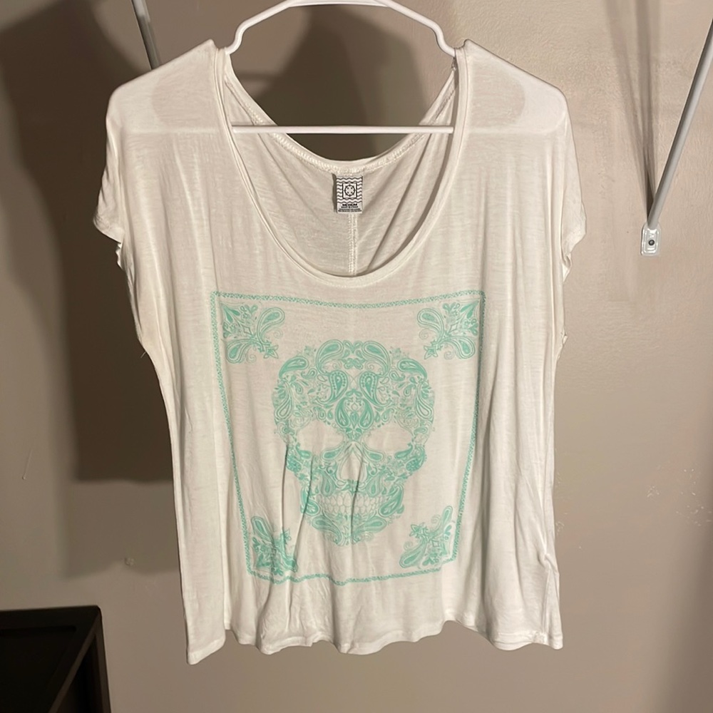 White with blue skull shirt sleeve shirt. Size medium.